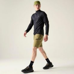 Szorty Dare 2B Tuned In Pro. Niebieskie szorty męskie Dare 2b, z materiału, bez kołnierzyka. Za 159.99 zł.