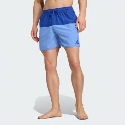 Szorty kąpielowe Colorblock 5 Inch. Niebieskie szorty sportowe męskie Adidas, z tkaniny. Za 149.00 zł.