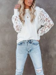 Milan Kiss Bluzka w kolorze białym rozmiar: XL. Białe bluzki damskie Milan Kiss, xl, bez wzorów, z koronki, bez kołnierzyka, bez ramiączek. Za 126.99 zł.