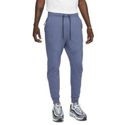 Spodnie sportowe męskie Nike Tech Jggr Lghtwht. Niebieskie spodnie dresowe męskie Nike, z dresówki. Za 441.00 zł.