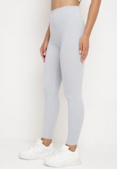 Jasnoniebieskie Legginsy z Wysokim Stanem Parefia. Niebieskie legginsy damskie Born2be, l, bez wzorów, z jeansu. Za 29.99 zł.