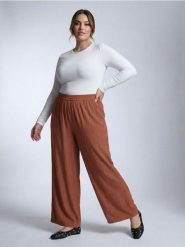 Wiskozowe spodnie wide leg Plus Size - żółty. Żółte spodnie materiałowe damskie Sinsay, bez wzorów, z wiskozy, plus size. Za 39.99 zł.
