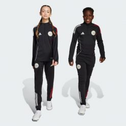 Spodnie treningowe Ajax Amsterdam Tiro 25 Competition. Białe spodnie dresowe damskie Adidas, na fitness i siłownię. Za 259.00 zł.