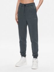 Calvin Klein Performance Spodnie dresowe 00GWS3P605 Zielony Regular Fit. Zielone spodnie dresowe damskie Calvin Klein Performance, m, bez wzorów, z bawełny. Za 329.99 zł.
