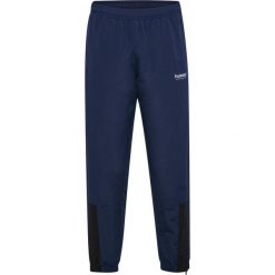 Spodnie dresowe Hummel hmlTRACKSUIT. Niebieskie spodnie sportowe damskie HUMMEL, s, z dresówki, na fitness i siłownię. Za 206.15 zł.