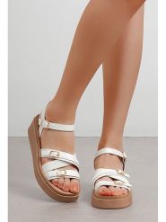 C'M Sandały w kolorze białym na koturnie rozmiar: 36. Białe sandały damskie C'M, bez wzorów, bez obcasa, na koturnie. Za 113.99 zł.