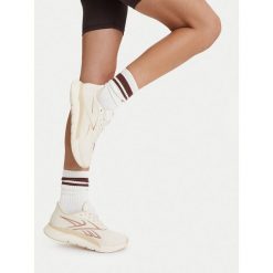 Buty na siłownię Reebok. Białe buty sportowe na co dzień damskie Reebok, bez wzorów, na fitness i siłownię. Za 399.99 zł.