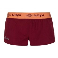 Spodenki damskie Kilpi Irazu. Czerwone spodenki sportowe damskie Kilpi, bez wzorów, z materiału. Za 153.53 zł.