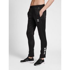 Spodnie dresowe damskie Hummel hmlcore xk poly. Czarne spodnie sportowe damskie HUMMEL, uniwersalny, z dresówki, do piłki nożnej. Za 197.00 zł.