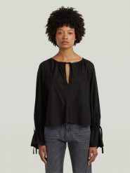 G-Star Bluzka w kolorze czarnym rozmiar: L. Czarne bluzki damskie G-Star, l, bez wzorów, z lyocellu, retro, bez kołnierzyka, bez ramiączek. Za 156.61 zł.
