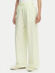 Tommy Jeans Spodnie materiałowe DW0DW22285 Zielony jasny Loose Fit. Zielone jeansy damskie Tommy Jeans, bez wzorów, z jeansu. Za 409.99 zł.