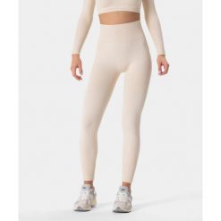 Legginsy bezszwowe Carpatree Allure bezowe. Brązowe legginsy sportowe damskie Carpatree, xs, bez wzorów, z materiału, na fitness i siłownię. W wyprzedaży za 169.99 zł.