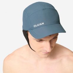 Czapka z daszkiem surfingowa męska Decathlon 100. Niebieskie czapki męskie Decathlon, bez wzorów, z materiału, sportowe. Za 39.99 zł.