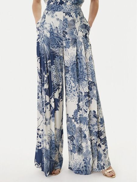 Guess Spodnie materiałowe W6GB02 W1578 Niebieski Regular Fit. Niebieskie spodnie materiałowe damskie Guess, z aplikacjami, z materiału. Za 614.99 zł.