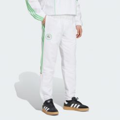 Spodnie dresowe Algeria UBP. Białe spodnie dresowe męskie Adidas, bez wzorów, z dresówki. W wyprzedaży za 230.30 zł.