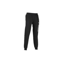 Spodnie dresowe regular Gym & Pilates męskie. Czarne spodnie sportowe męskie Puma, z bawełny. Za 159.99 zł.