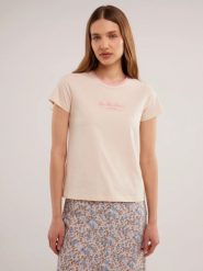 Koszulka damska z kontrastowym wykoŅczeniem kremowa Bessa 103. Białe t-shirty damskie Big Star, l, bez wzorów, z dzianiny, bez kołnierzyka. W wyprzedaży za 29.99 zł.