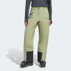 Dwuwarstwowe ocieplane spodnie Terrex Multi CLIMAPROOF. Zielone spodnie materiałowe damskie Adidas, bez wzorów, z materiału, klasyczne, z standardowym stanem. Za 899.00 zł.