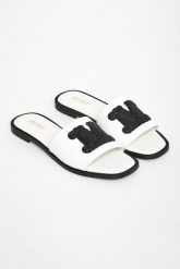 Klapki damskie skórzane Gene MAX MARA BEACHWEAR. Klapki damskie Max Mara Beachwear, bez wzorów, bez obcasa. W wyprzedaży za 775.20 zł.