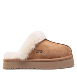 Kapcie Ugg. Brązowe kapcie damskie Ugg. Za 509.99 zł.