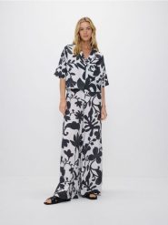 Wzorzyste spodnie palazzo - czarny. Czarne spodnie materiałowe damskie Reserved, bez wzorów, z tkaniny. W wyprzedaży za 45.99 zł.