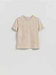 T-shirt z aplikacją - kremowy. Białe t-shirty damskie Reserved, l, z aplikacjami, z bawełny, bez kołnierzyka. Za 69.99 zł.