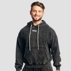 Bluza męska z kapturem oversize z efektem sprania czarna Aura. Czarne bluzy sportowe męskie GYMBEAM, bez wzorów, z bawełny, bez kołnierzyka, bez ramiączek. Za 139.90 zł.