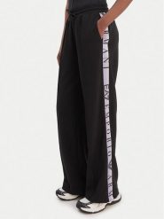 EA7 Emporio Armani Spodnie dresowe 7W001155 AF12501 UC001 Czarny Relaxed Fit. Czarne spodnie dresowe damskie EA7 Emporio Armani, xl, bez wzorów, z dresówki. Za 529.99 zł.