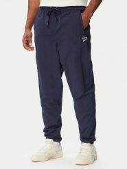 Reebok Spodnie dresowe Mieszko RK25722CCM Granatowy Regular Fit. Niebieskie spodnie dresowe męskie Reebok, bez wzorów, z dresówki. Za 299.99 zł.
