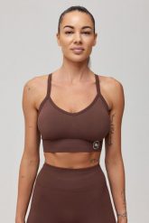 Stanik sportowy bezszwowy Rough Radical Seamless Classic Sports Bra. Zielone biustonosze sportowe damskie ROUGH RADICAL, bez wzorów, z dzianiny. Za 139.90 zł.