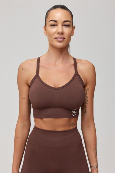 Stanik sportowy bezszwowy Rough Radical Seamless Classic Sports Bra. Zielone biustonosze sportowe damskie ROUGH RADICAL, bez wzorów, z dzianiny. Za 139.90 zł.