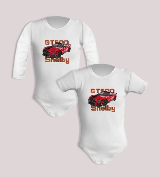 Ford Mustang Shelby — body (Rozmiar: 9M; Długość rękawa: długi; Rodzaj nadruku: Ford Mustang Shelby). Żółte body niemowlęce nikiniki, bez wzorów, z bawełny, bez ramiączek. Za 59.00 zł.