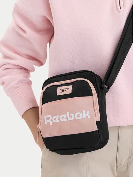 Reebok Torebka CWBEO-RBK-P-003-08 Czarny. Czarne listonoszki damskie Reebok, bez wzorów, z materiału, bez dodatków. Za 69.99 zł.