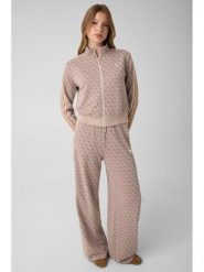Guess Spodnie dresowe V6YB27 K5181 Beżowy Relaxed Fit. Brązowe spodnie dresowe damskie Guess, s, z aplikacjami, z dresówki. Za 474.99 zł.