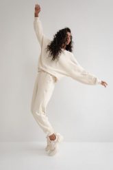 Spodnie dresowe typu jogger w kolorze BRIGHT BEIGE ze strukturalnej dzianiny - DISPLAY-XL. Brązowe spodnie dresowe damskie Marsala, xl, bez wzorów, z bawełny. W wyprzedaży za 124.95 zł.