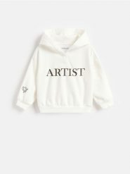 Bluza z nadrukiem - złamana biel. Bluzy i bluzki niemowlęce Reserved, bez wzorów, z bawełny, bez ramiączek, bez kaptura. Za 49.99 zł.
