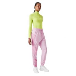 Spodnie damskie Lacoste. Czerwone spodnie sportowe damskie Lacoste, s, z dresówki. Za 387.00 zł.