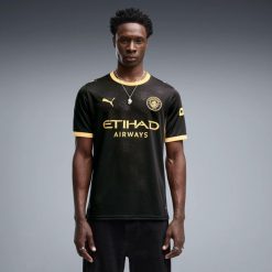 Koszulka piłkarska Puma Manchester City 26/27 wyjazdowa. Czarne t-shirty sportowe męskie Puma, xl, bez wzorów, z materiału, bez ramiączek. Za 439.99 zł.