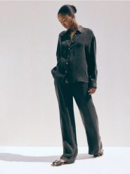 Spodnie palazzo z lyocellem - ciemnoszary. Szare spodnie materiałowe damskie Reserved, bez wzorów, z lyocellu. W wyprzedaży za 99.99 zł.