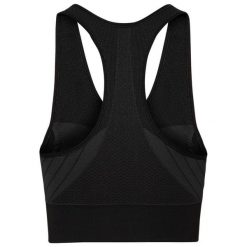 Top sportowy damski Seamless Medium. Czarne topy sportowe damskie Odlo, bez wzorów, bez ramiączek. Za 219.99 zł.