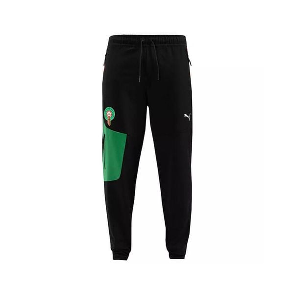 Spodnie dresowe Maroc 2024. Czarne spodnie dresowe męskie Puma, bez wzorów, z dresówki. W wyprzedaży za 278.25 zł.