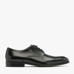 Czarne półbuty męskie ANDREW. Czarne buty wizytowe męskie Ryłko, ze skóry, bez zapięcia. Za 529.99 zł.
