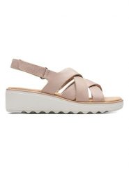 Clarks Skórzane sandały w kolorze jasnoróżowym na koturnie rozmiar: 39. Różowe sandały damskie Clarks, bez wzorów, ze skóry, bez obcasa, na koturnie. Za 125.85 zł.