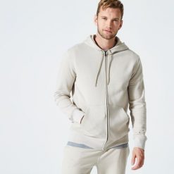 Bluza z kapturem męska Domyos Gym & Pilates. Brązowe bluzy sportowe męskie DOMYOS, bez wzorów, z materiału, sportowe, bez kołnierzyka, bez ramiączek. Za 99.99 zł.