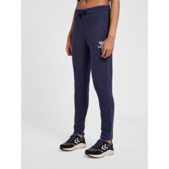 Dopasowane spodnie do biegania damskie Hummel Noni 2.0. Niebieskie spodnie materiałowe damskie HUMMEL, bez wzorów, sportowe. Za 157.00 zł.
