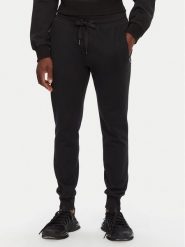 Dolce&Gabbana Spodnie dresowe GVXQHT G7F2G Czarny Regular Fit. Czarne spodnie dresowe męskie Dolce&Gabbana, bez wzorów, z bawełny. Za 2,549.00 zł.