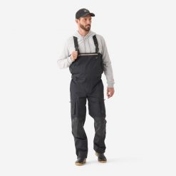 Spodnie wędkarskie Caperlan 900 wodoodporne. Czarne spodnie materiałowe męskie CAPERLAN, bez wzorów, z materiału, sportowe. Za 549.99 zł.