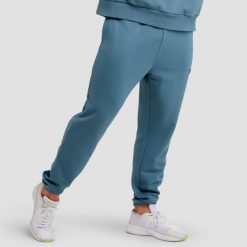 Spodnie męskie fitness regular niebieskie Unity. Niebieskie spodnie sportowe męskie GYMBEAM, z bawełny. Za 118.90 zł.