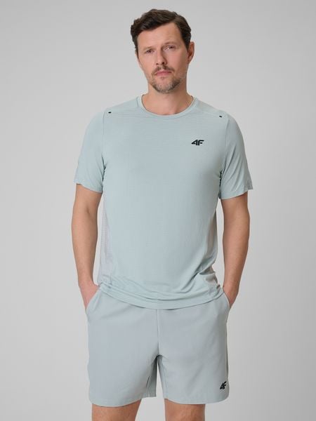 4F Koszulka regular treningowa szybkoschnąca męska - miętowa XXL. Niebieskie t-shirty sportowe męskie 4f, m, ze skóry, bez ramiączek, na fitness i siłownię. Za 129.99 zł.