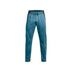 Spodnie dresowe Under Armour TRICOT FASHION TRACK. Niebieskie spodnie sportowe męskie Under Armour, z dresówki. Za 305.80 zł.